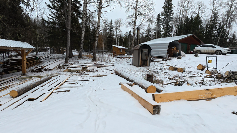 The boiler on its concrete pad in winter